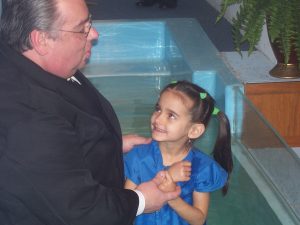 Right before we left on our trip, Hannah was baptized at our church by our dear Pastor Bartlett.