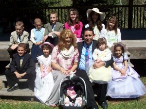 Next is me (Jill) with David and our 11 children.........hugs.