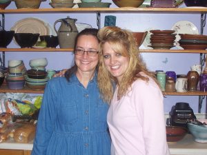 Wendy is an awesome "Pottery Maker".  She has given me some priceless, handmade items and also helped our children make each of their own bowls.  Notice the beautiful handiwork on her shelf behind us!