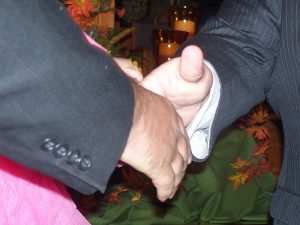 David and Pastor shaking hands.