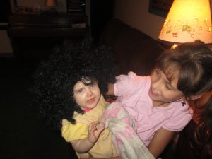 Tessie put a "wig" on Sofia at the Philbricks.  SO funny!