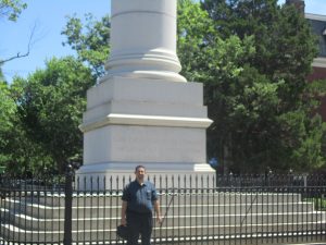 David standing in front of a statue honoring the veterans of the Civil War.