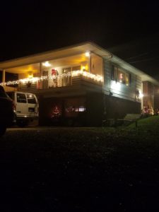 Our home outside during Christmas time!!  COZY
