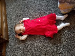 Fell asleep right on the floor.  We snapped this picture right before Daddy picked her up and put her to bed.  SO adorable!!
